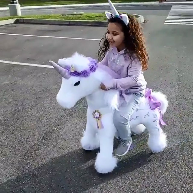Enjoy the Freedom on her unicorn