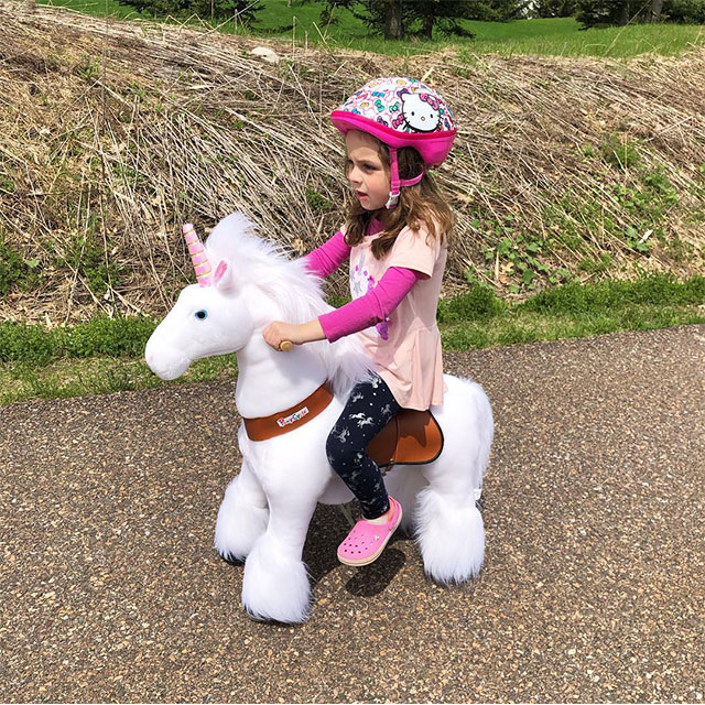 Riding a unicorn in the countryside